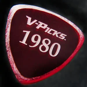 Solange Der Vorrat Reicht 1980 Guitar&Mandolin Pick ruby